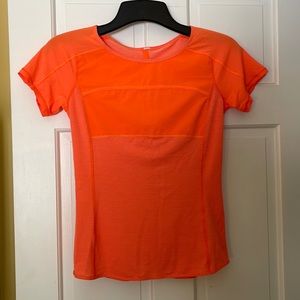 Lululemon lightweight breathable with anti-stink technology orange shirt